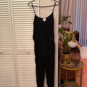 Parker black sequence and beaded jumpsuit with pockets. Good condition. Size xs.